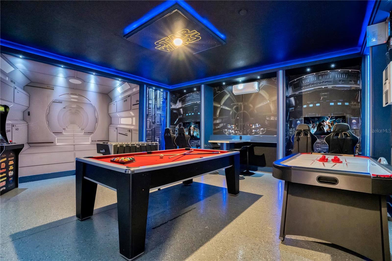 Welcome to The Galactic Arcade! This Star Wars-inspired entertainment space features billiards, arcade gaming, immersive lighting, and an out-of-this-world atmosphere designed for unforgettable fun
