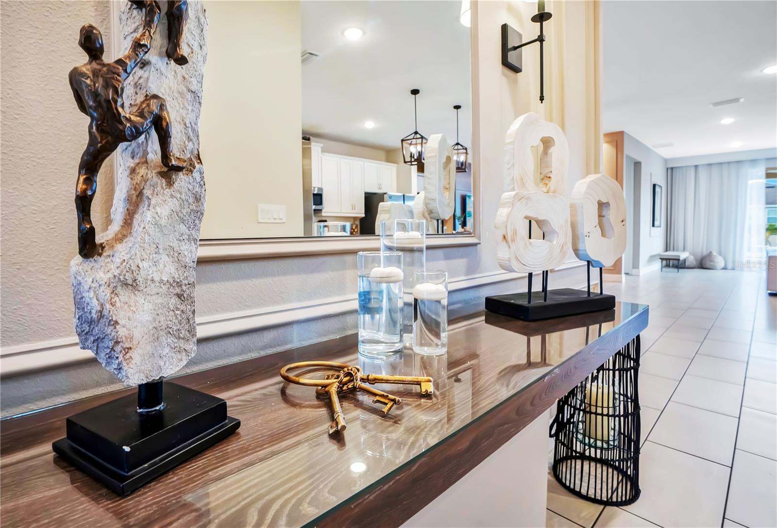 Thoughtfully curated furnishings, artwork, and decorative accents elevate every detail of this beautifully designed residence