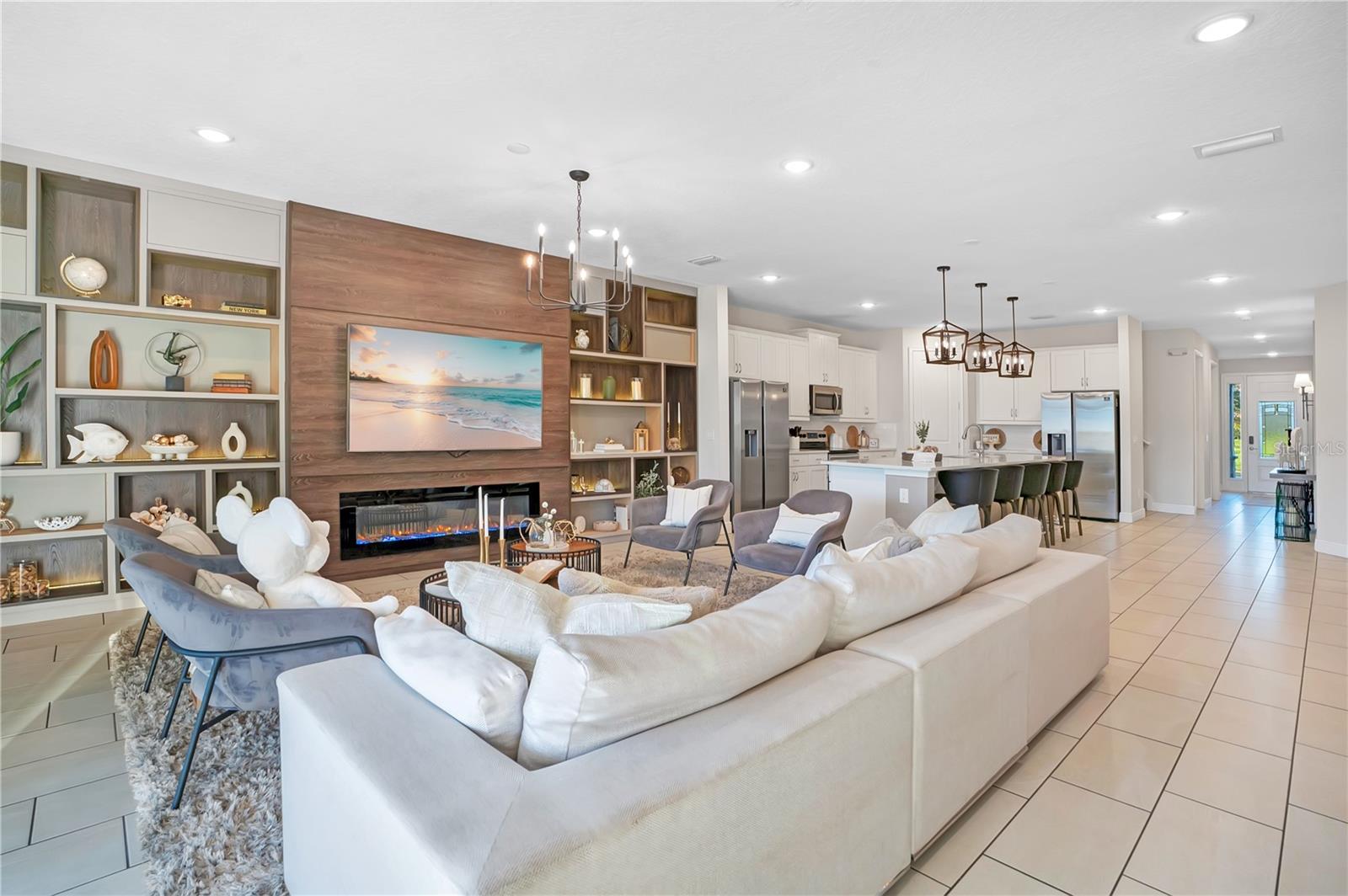 A distinctive open floor plan with beautifully coordinated living and dining spaces