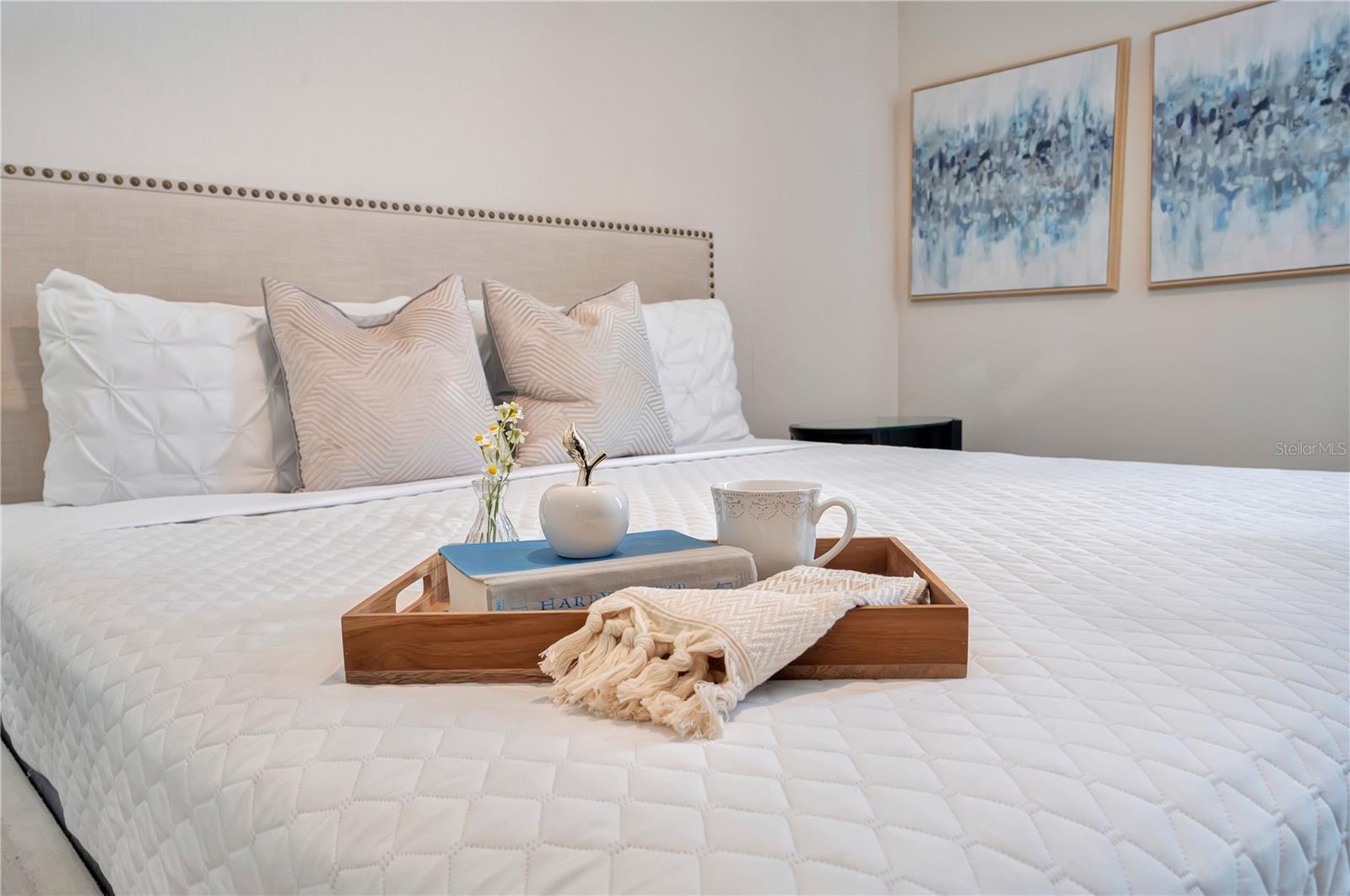 Boutique-inspired bedding and carefully curated details create a welcoming retreat