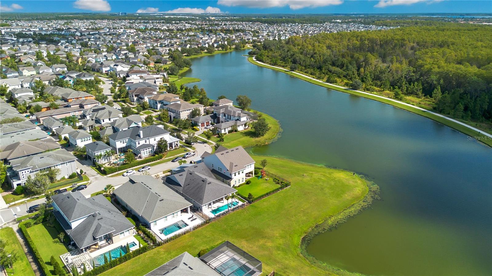 Aerial view of Laureate Park, one of Lake Nona's most sought after communities, with lakes, trails, and parks.
