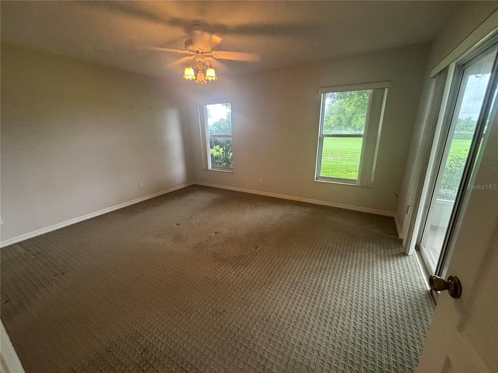 8815 VILLAGE GREEN BOULEVARD, Clermont, FL 34711