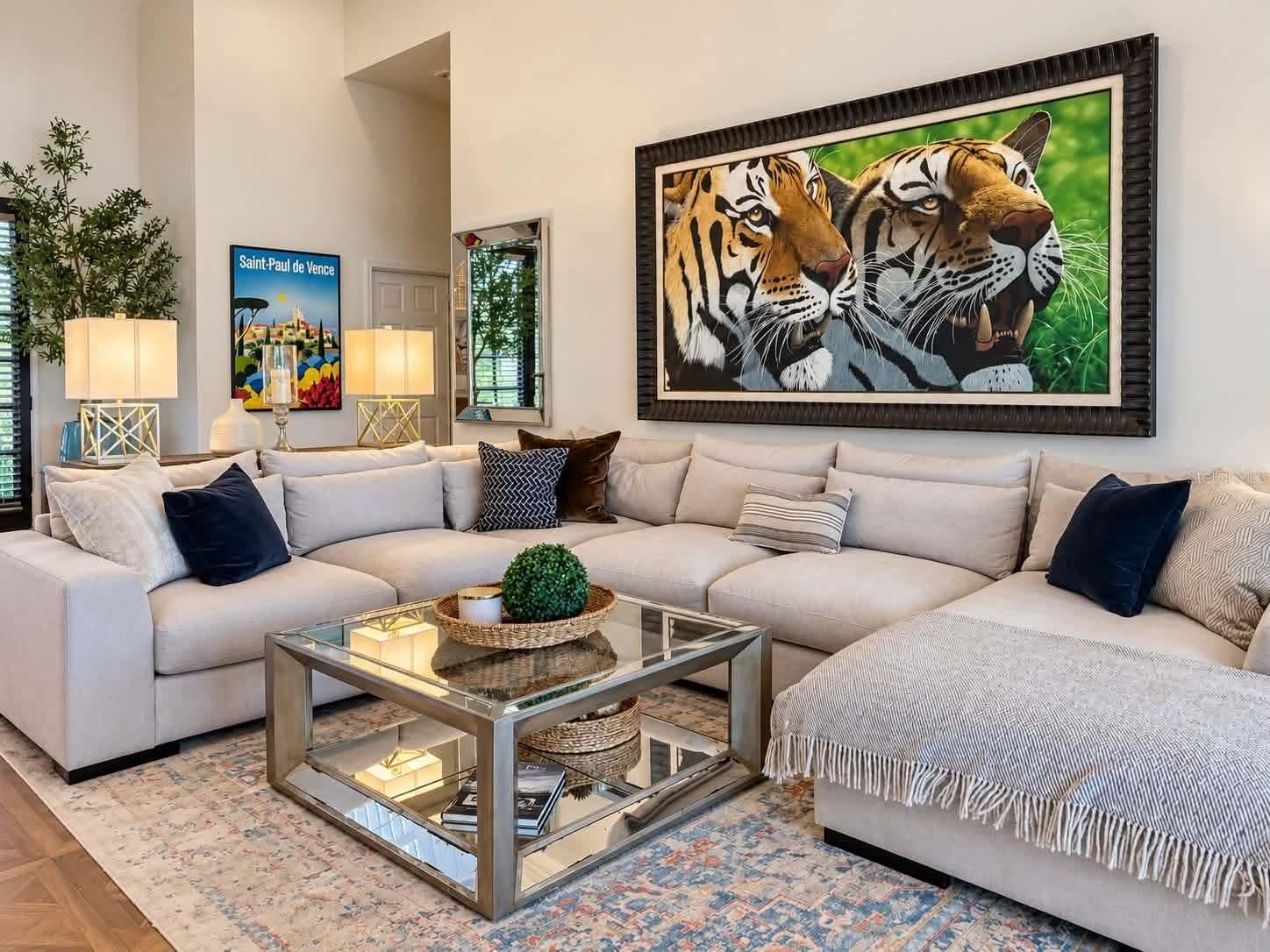 Living Room with cathedral ceilings and lake views