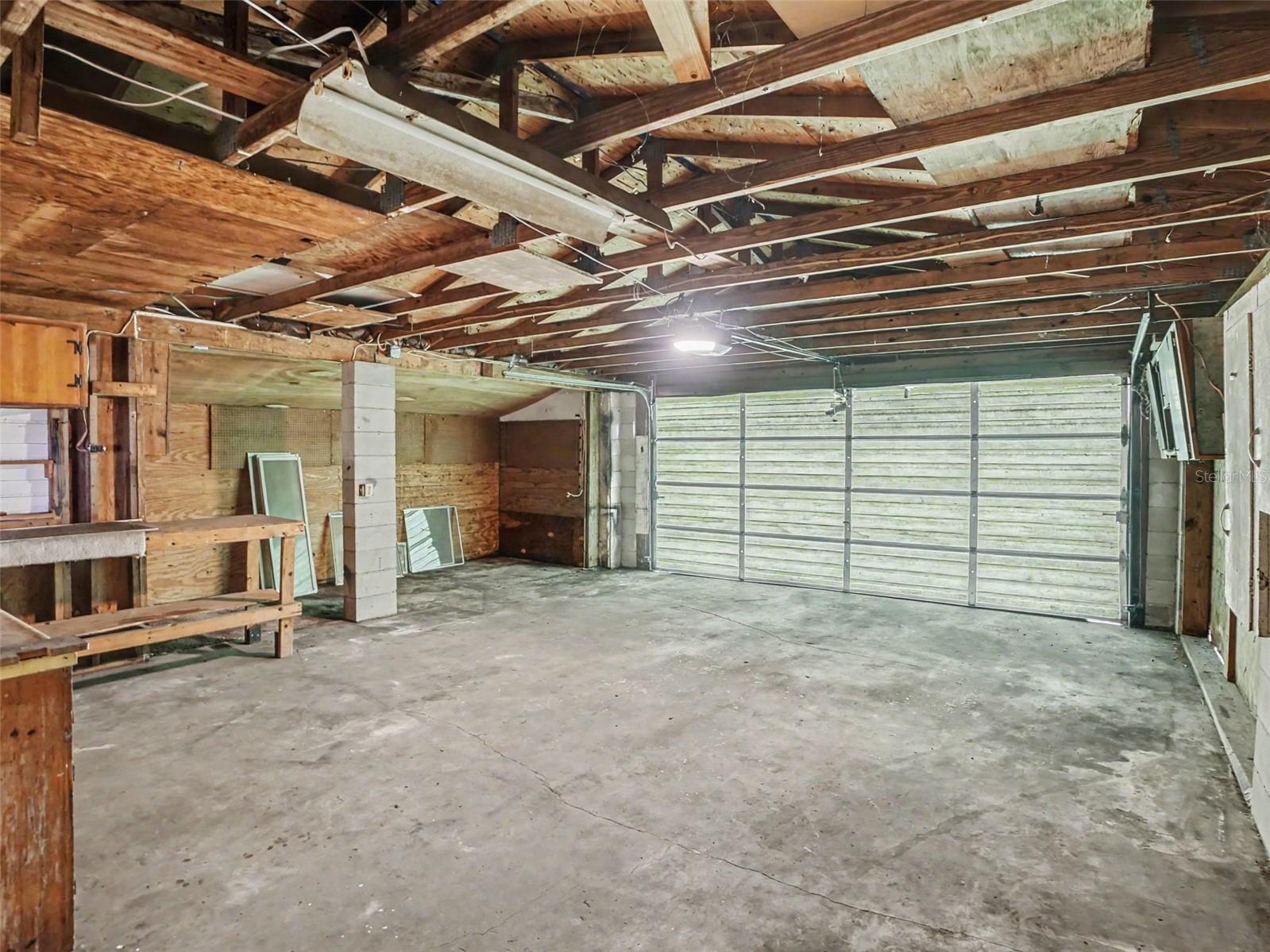Rear load garage with workshop area