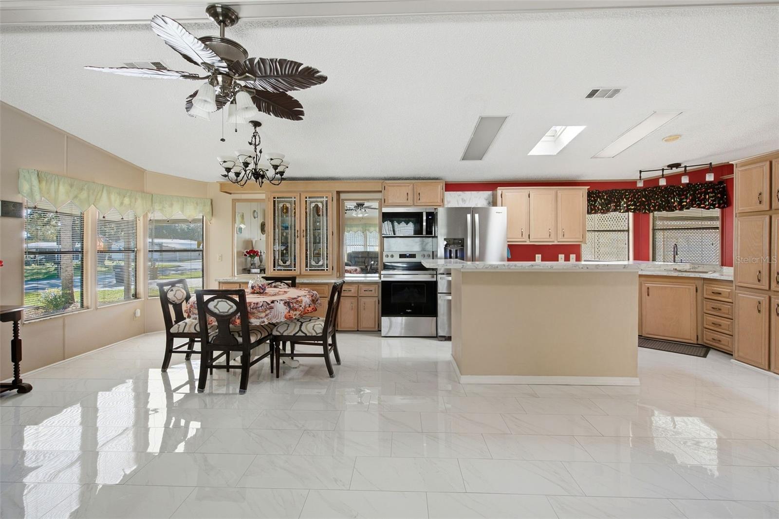 Virtually enhanced image depicting the anticipated finished appearance of the kitchen island. Island finishing work is pending completion.