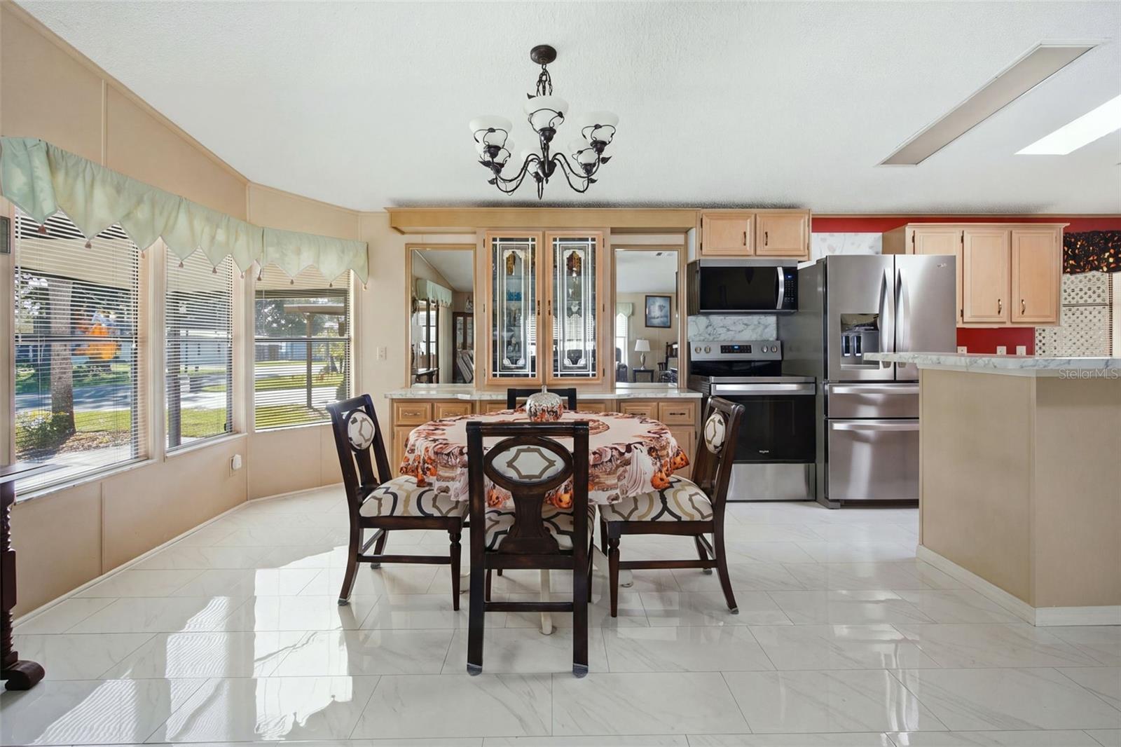 Virtually enhanced image depicting the anticipated finished appearance of the kitchen island. Island finishing work is pending completion.