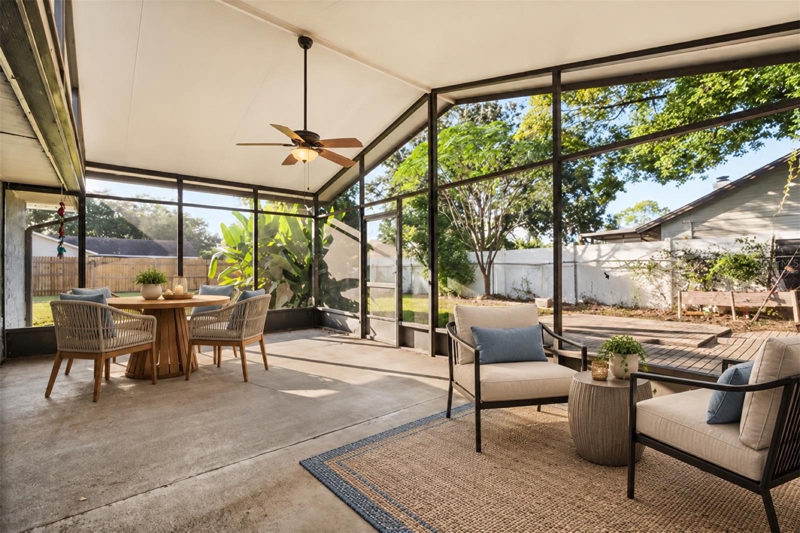 Covered rear porch- Virtually staged