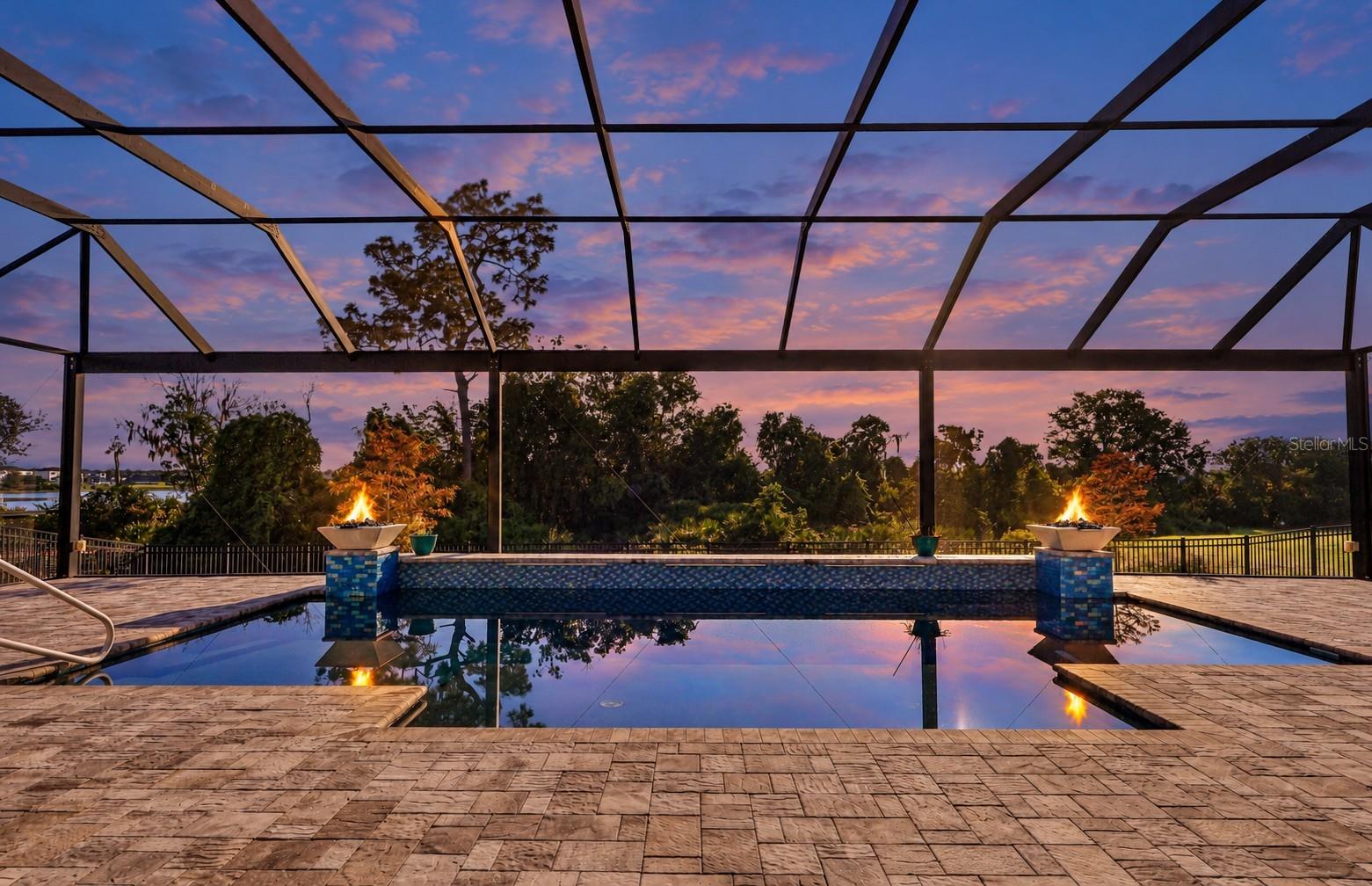 Your personal backyard oasis awaits! Virtual twilight/fire.