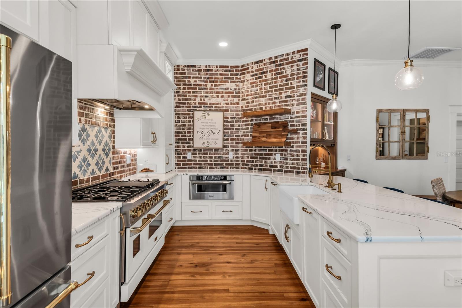 The chef's kitchen is a true focal point with a distinctive mix of old-world charm and modern design that combine luxury and function The chef's kitchen is a true focal point with a distinctive mix of old-world charm and modern design that combine luxury and function