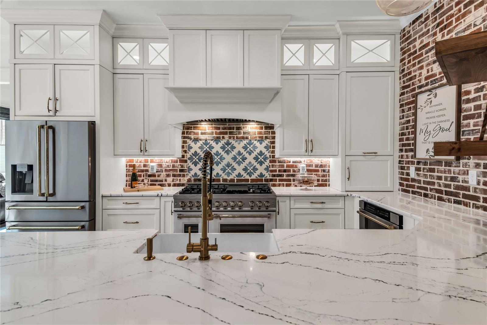 The chef's kitchen is a true focal point with a distinctive mix of old-world charm and modern design that combine luxury and function The chef's kitchen is a true focal point with a distinctive mix of old-world charm and modern design that combine luxury and function