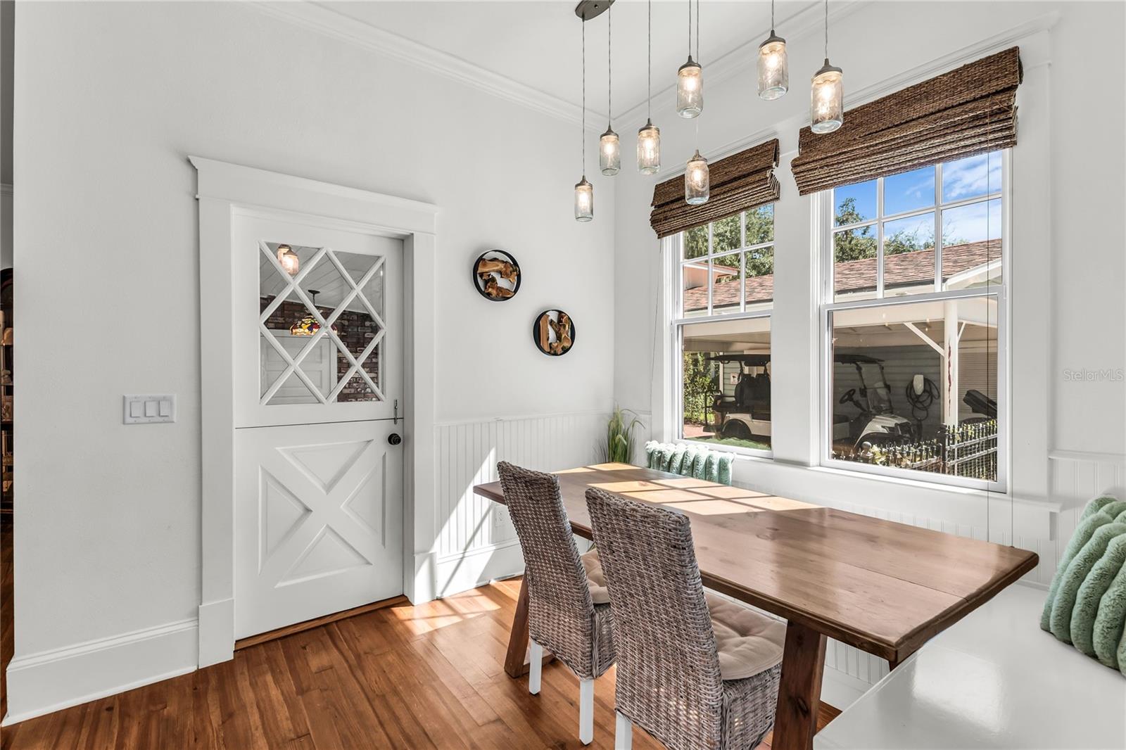 Bright and cozy breakfast nook with built-in seating
