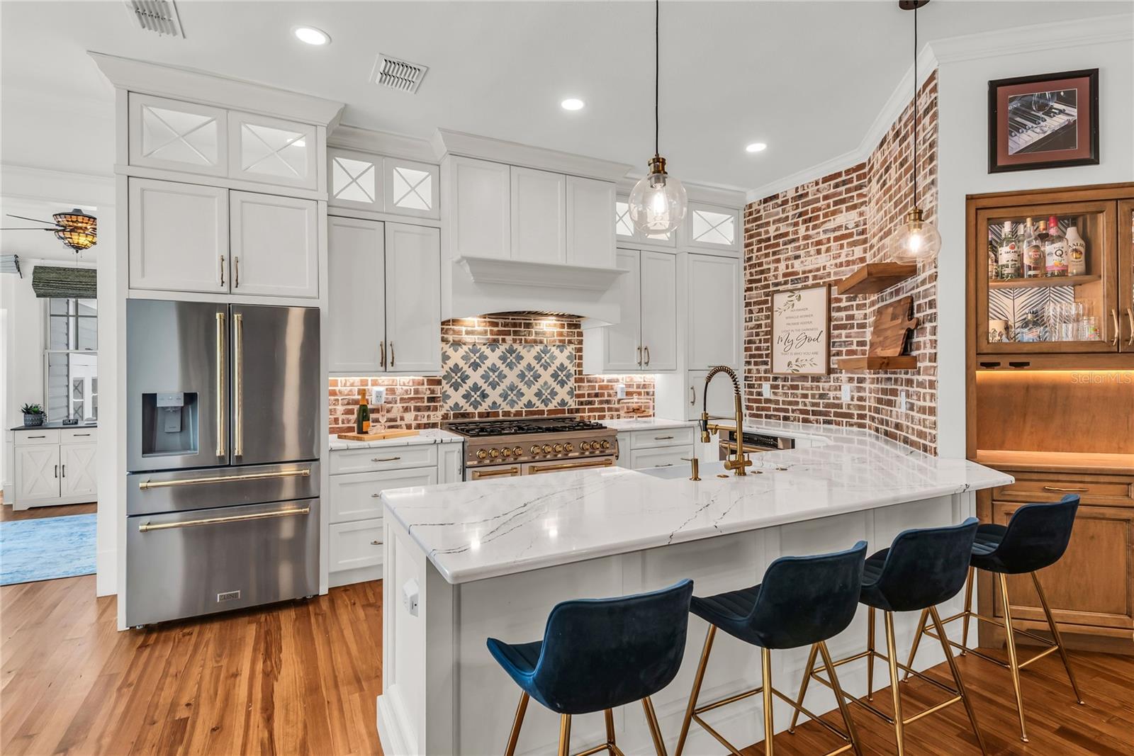 The chef's kitchen is a true focal point with a distinctive mix of old-world charm and modern design that combine luxury and function The chef's kitchen is a true focal point with a distinctive mix of old-world charm and modern design that combine luxury and function
