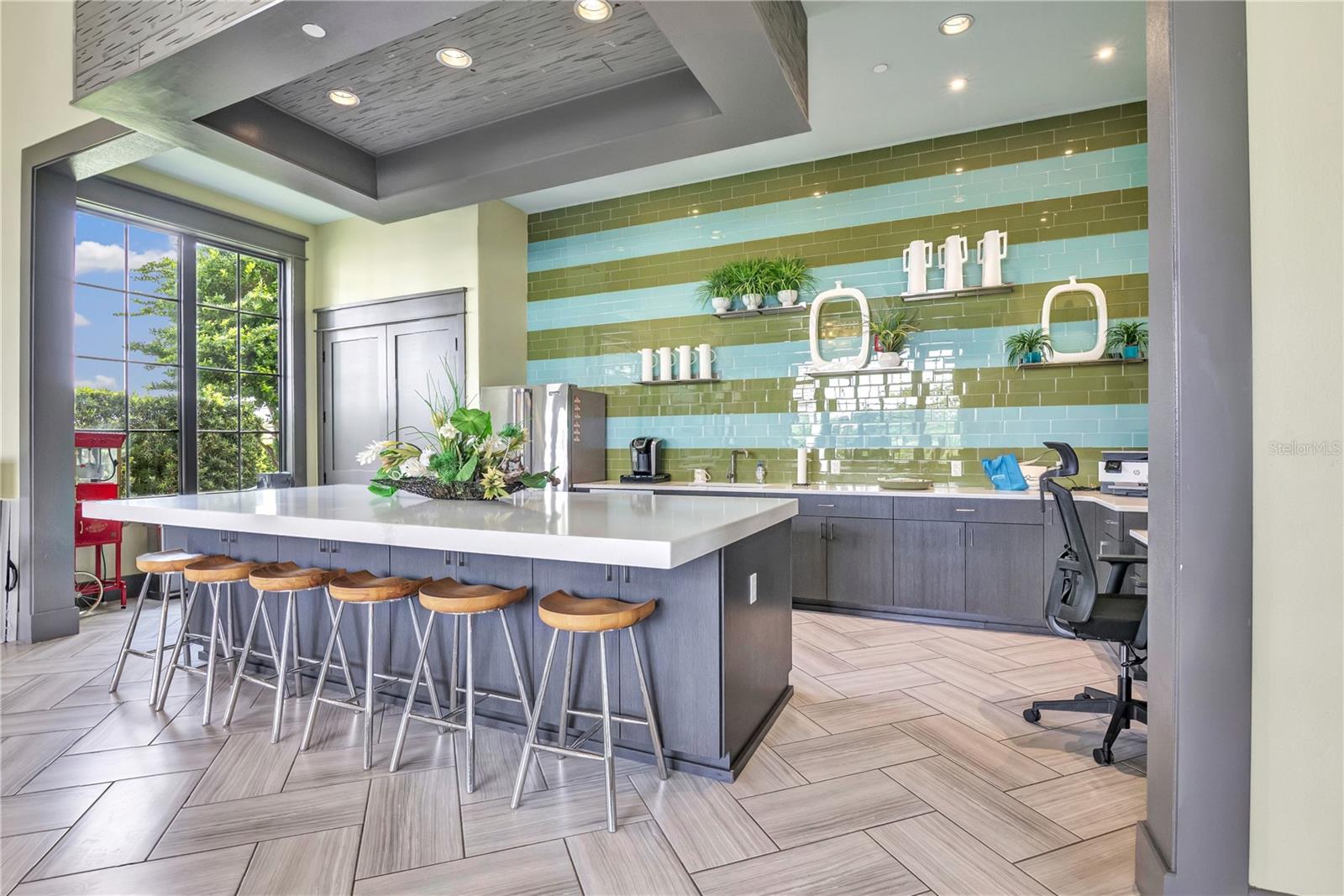 Elegant community clubhouse featuring impressive architectural details and inviting gathering spaces.