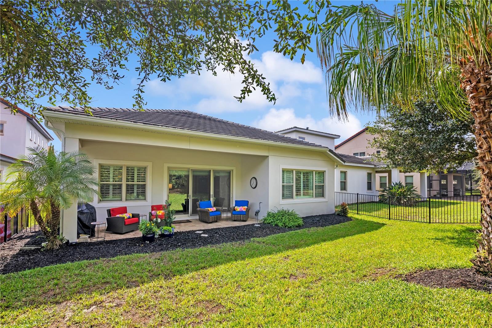 Enjoy Florida living from the covered patio, ideal for outdoor dining and relaxation.