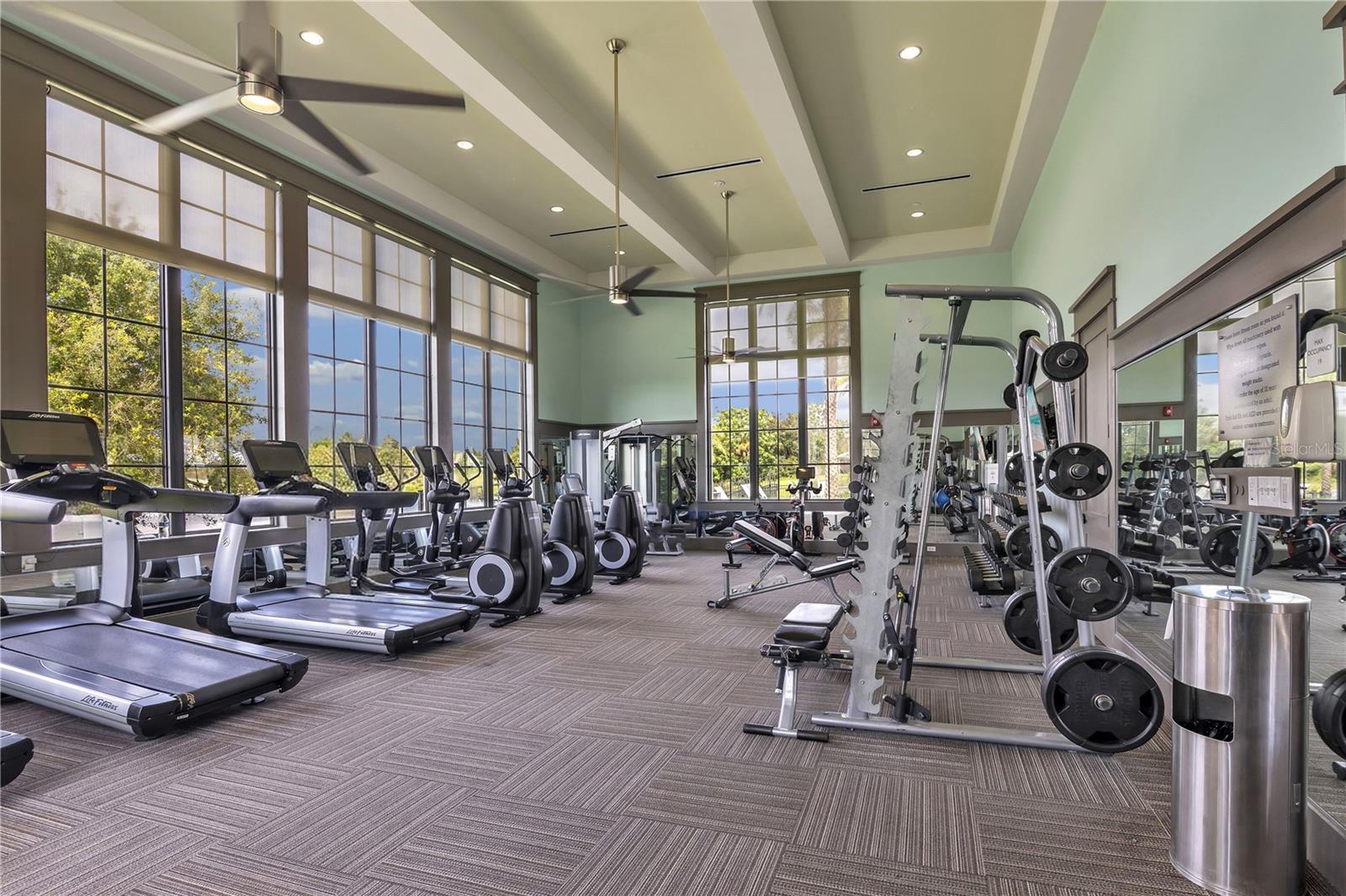Well-equipped community fitness center with cardio and strength-training equipment.