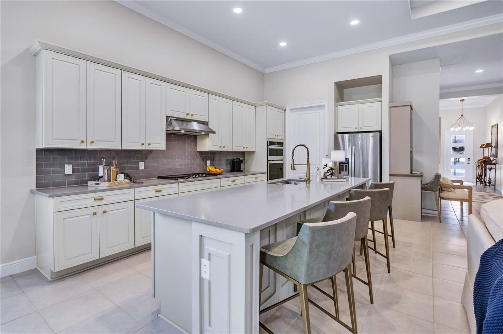 Beautifully appointed kitchen featuring generous counter space and stylish finishes.