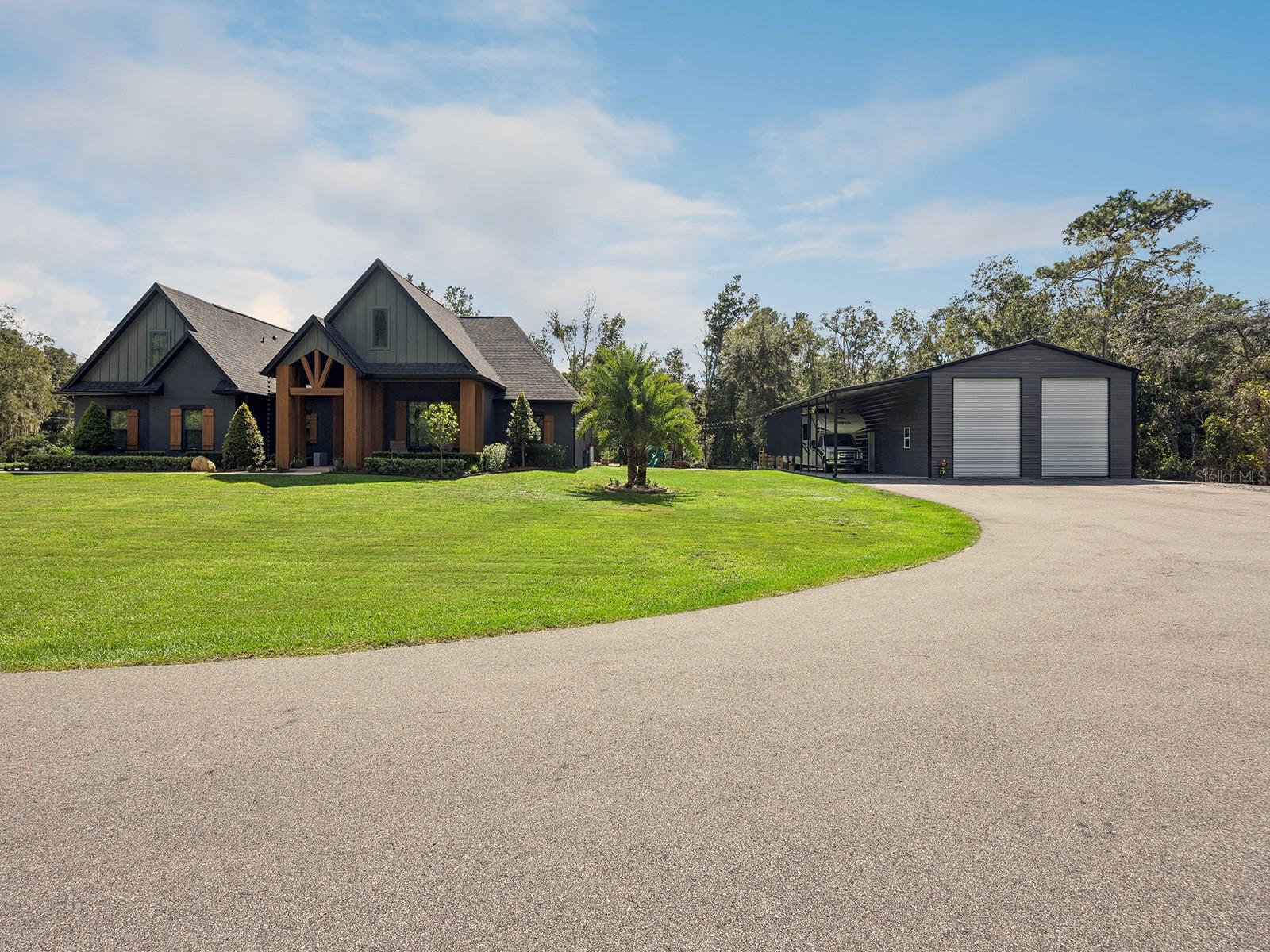 Exterior of home, RV carport and warehouse