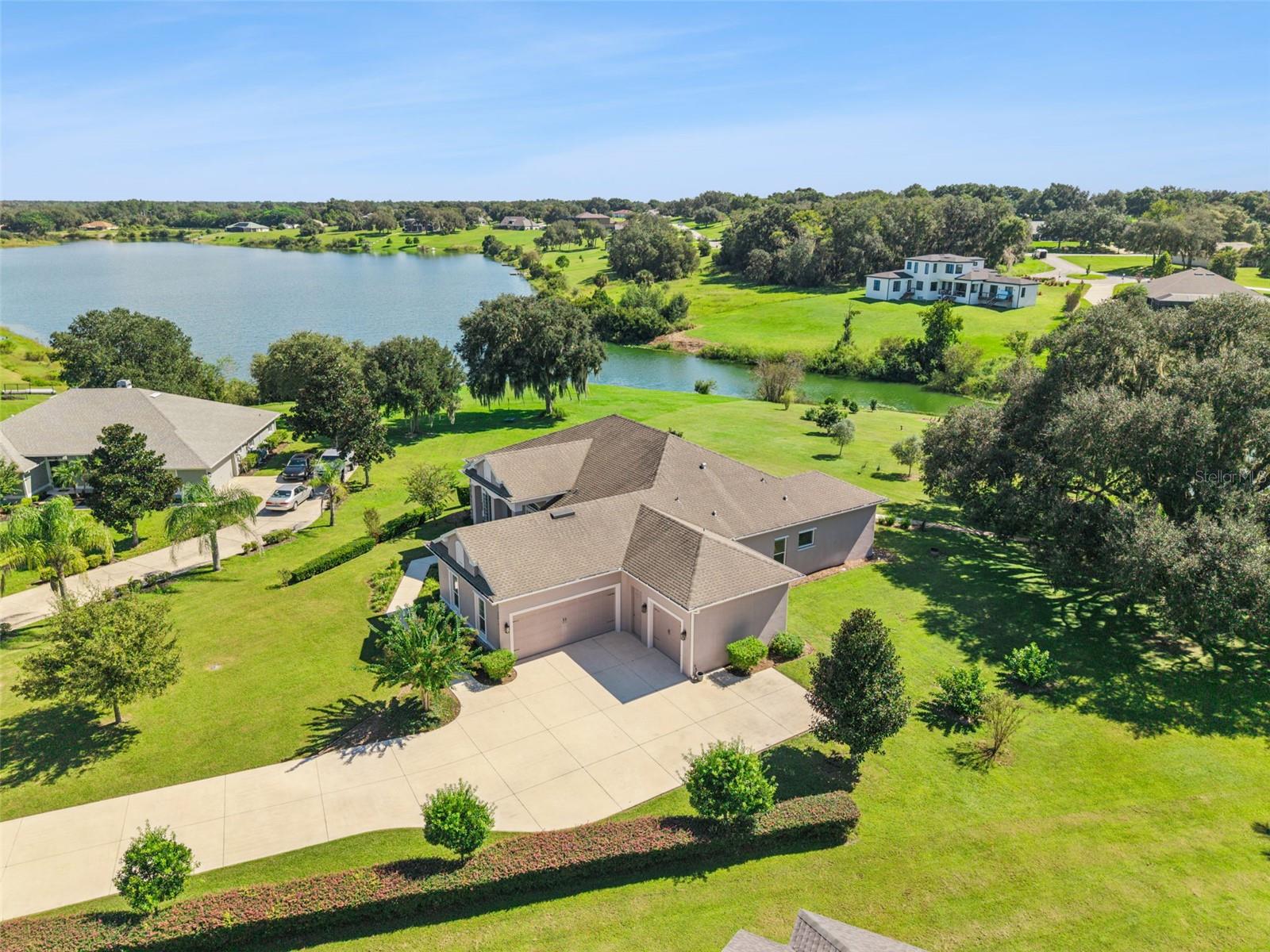 Welcome home to 36819 Wolf Ct. located on over 1.6 acres with water frontage