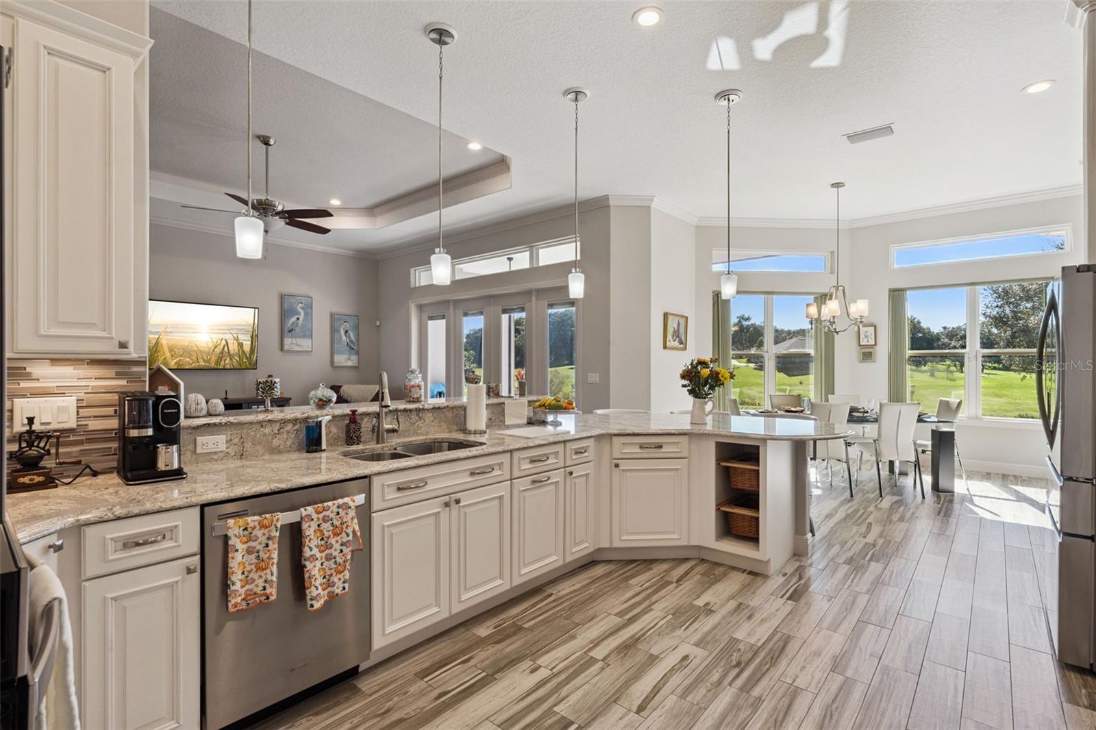 This kitchen is a chefs delight with quartz countertops, 42" cabinets and stainless appliances