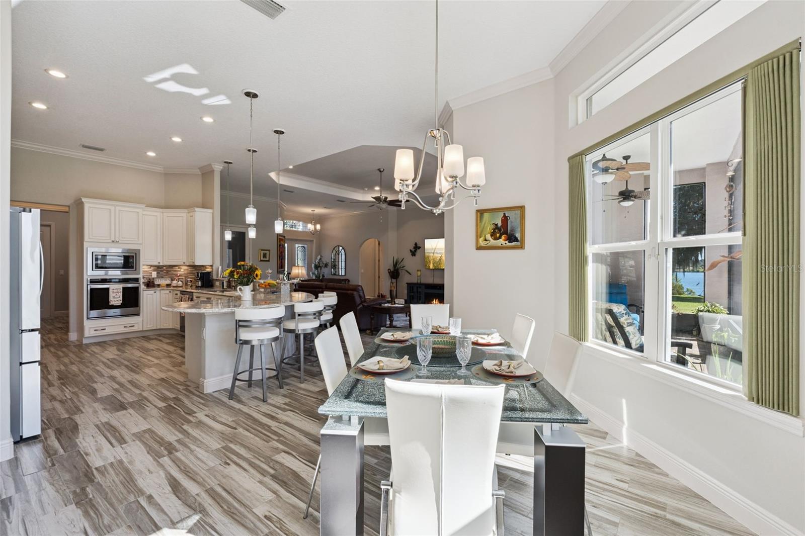Casual dining area off the kitchen featuring scenic water views.