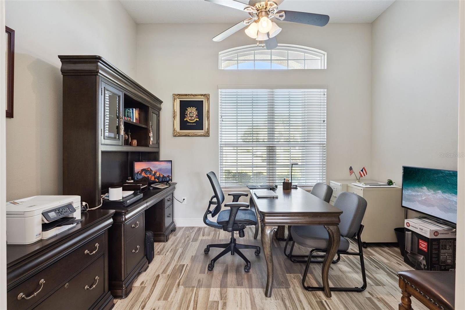 This home features a dedicated office space, providing the perfect environment for remote work and private professional meetings.