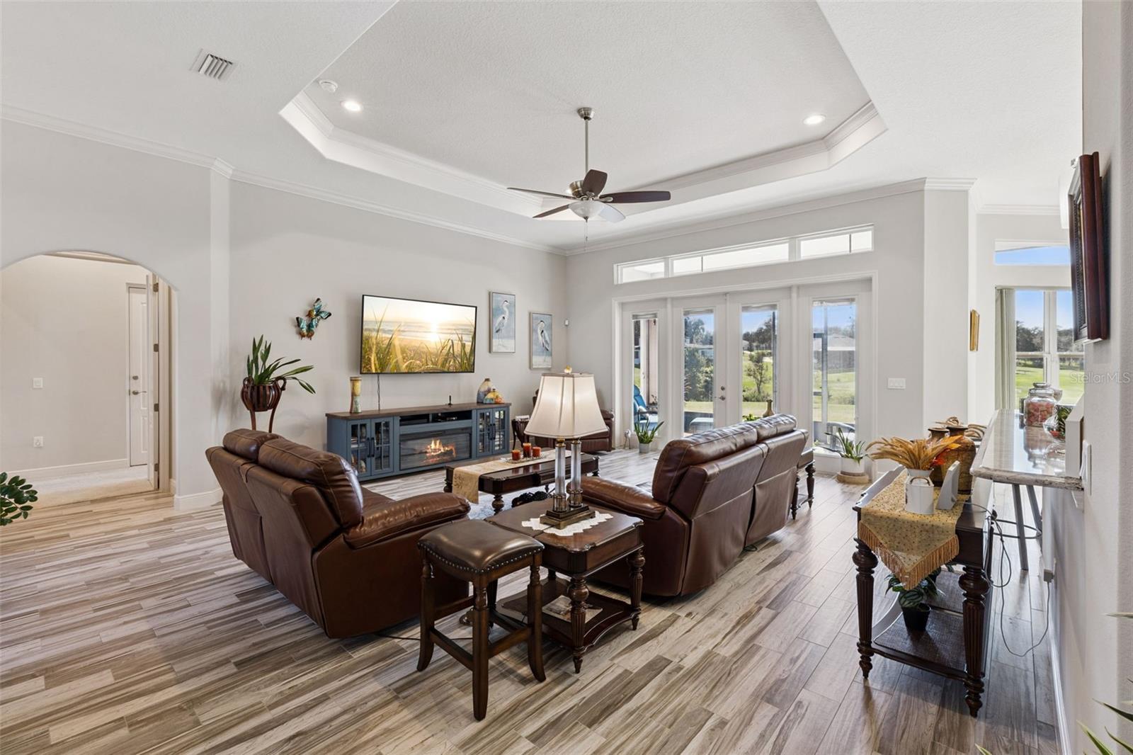 Family room with french doors to screened lanai