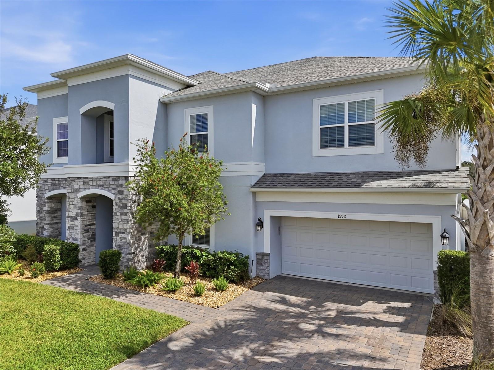 Welcome to 1552 Myrtle Oaks Trail in the gated community of Southern Oaks