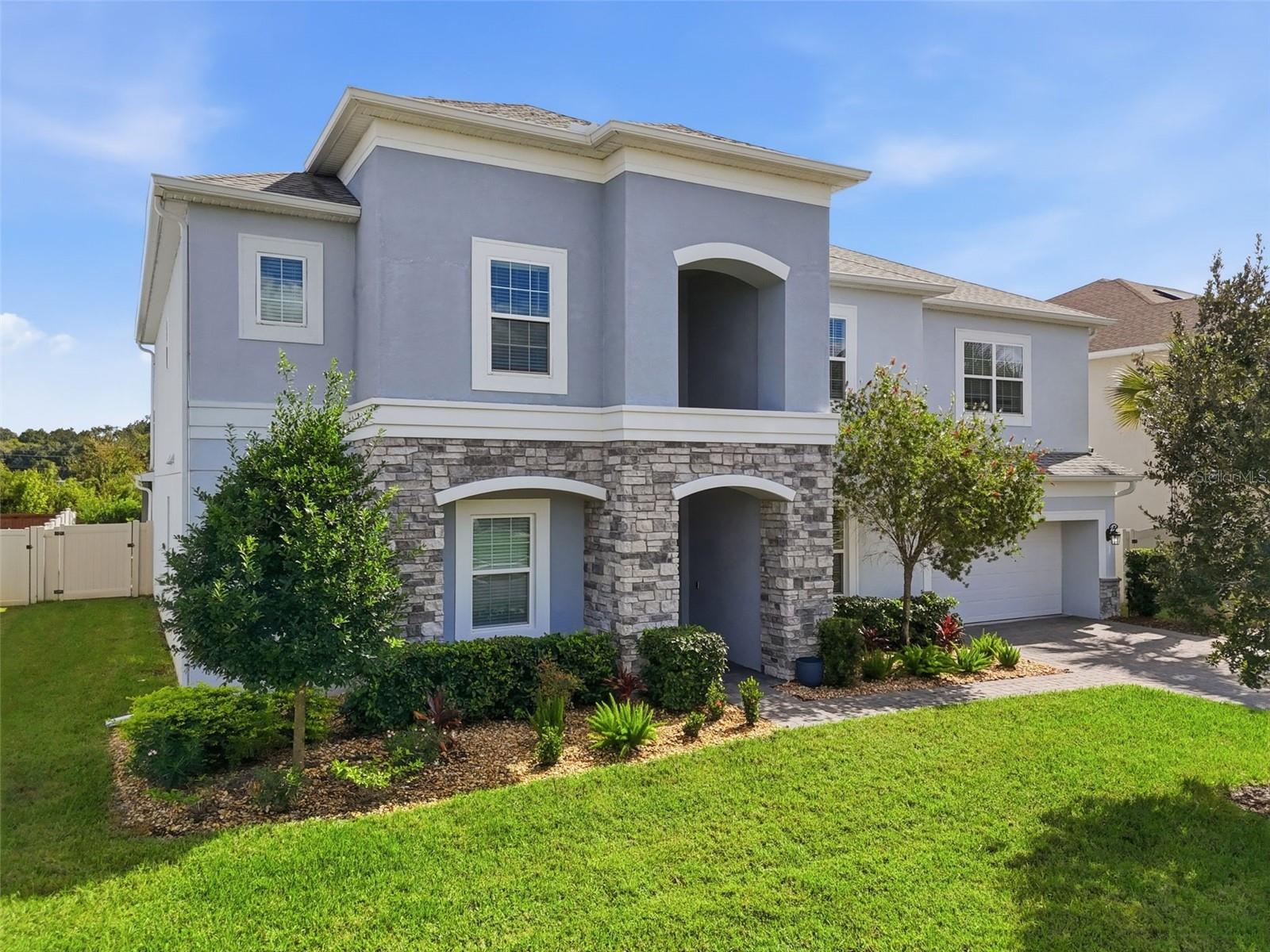 Nicely manicured and landscaped makes for great curb appeal