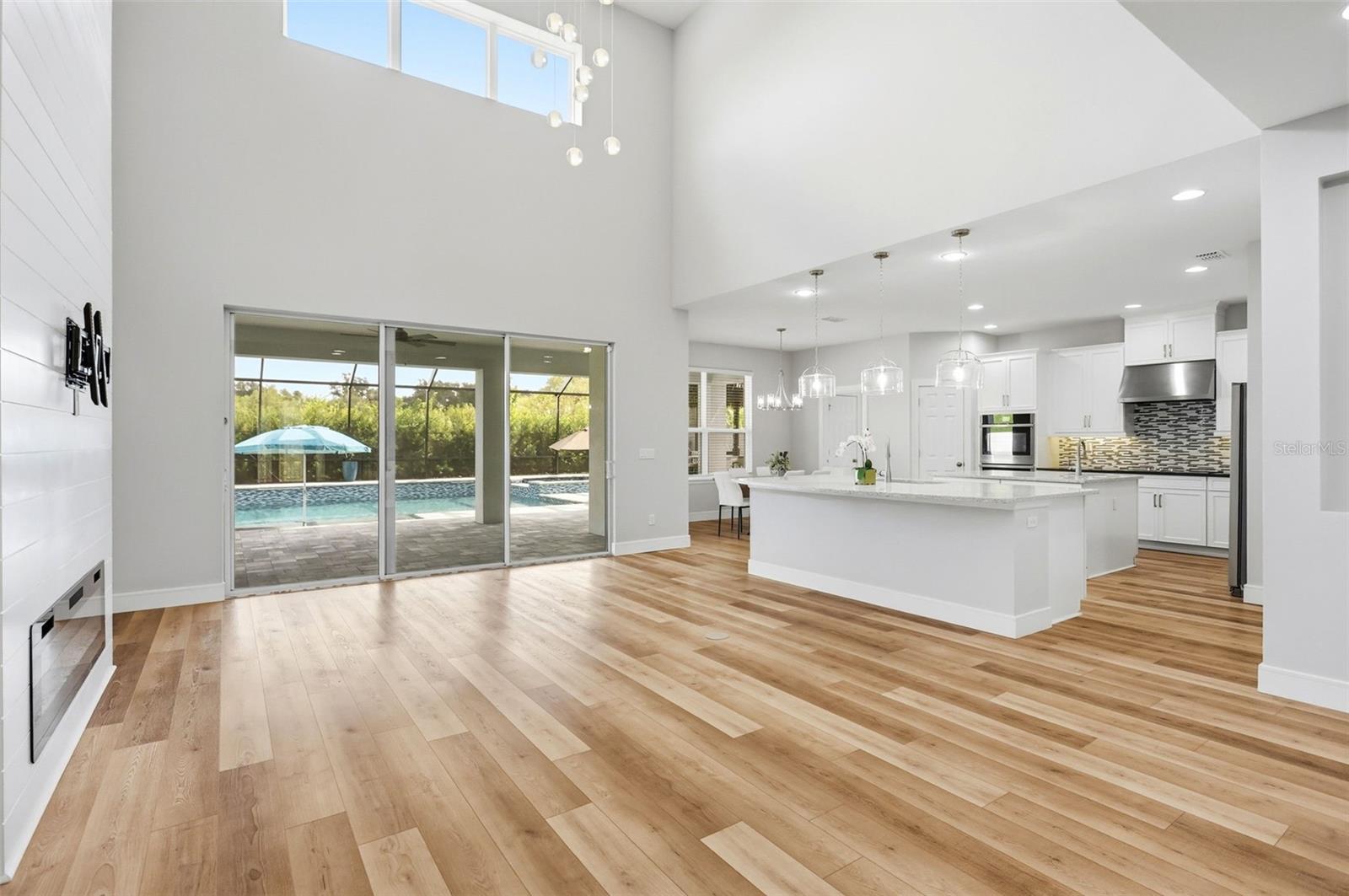 Newer luxury plank vinyl flooring throughout the downstairs