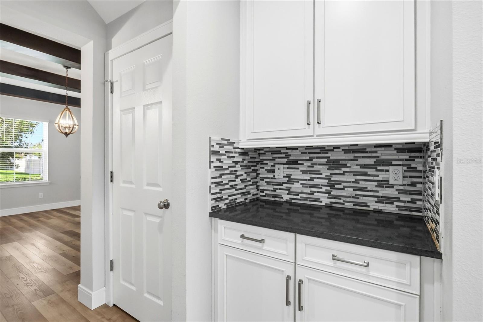 Beverage station between the dining room and kitchen