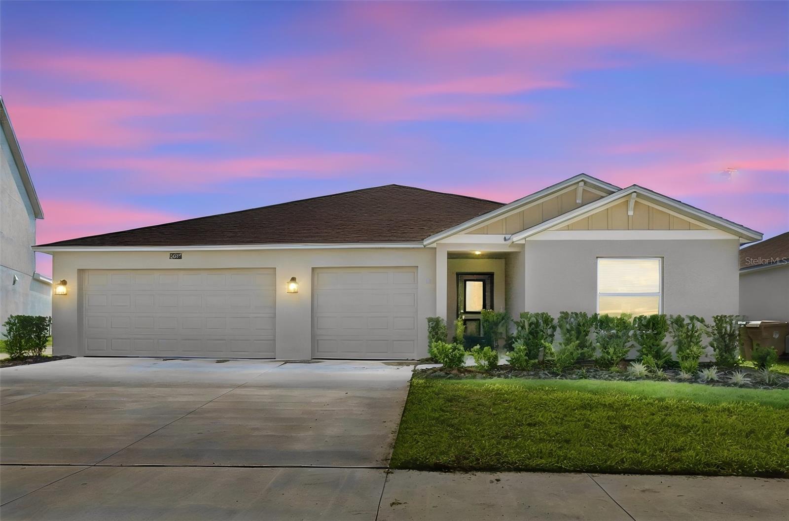 Built in 2025, this 3-bedroom, 2-bath home features a 3-car garage, an open-concept layout, and neutral finishes throughout.
