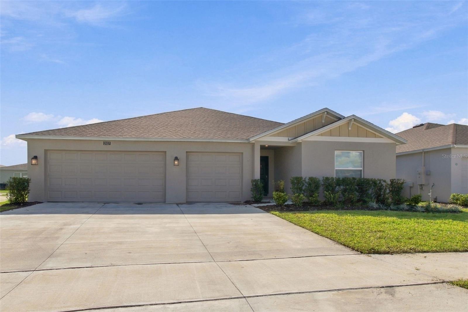 Built in 2025, this 3-bedroom, 2-bath home features a 3-car garage, an open-concept layout, and neutral finishes throughout.