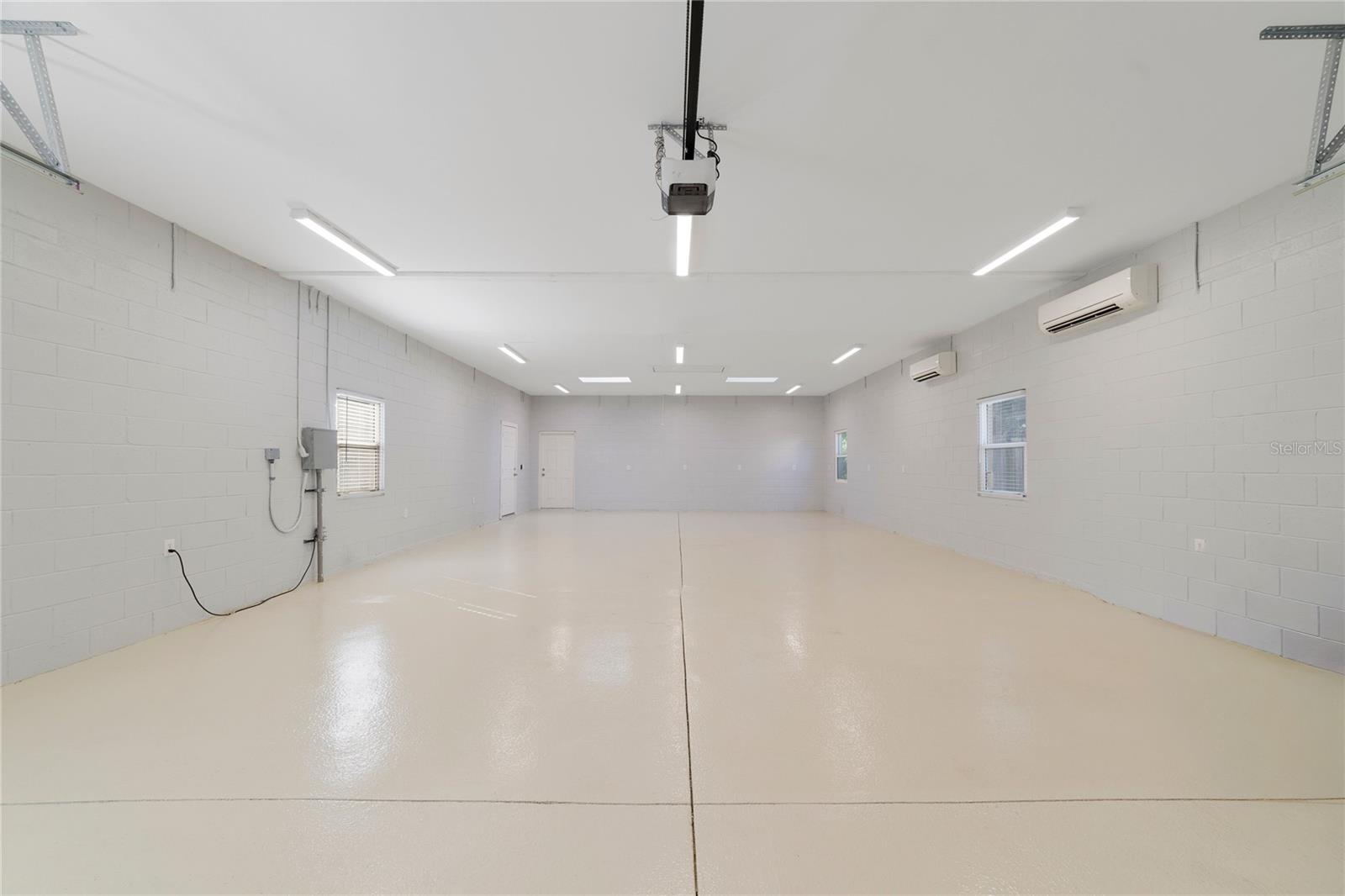 6 car garage/workshop/living space