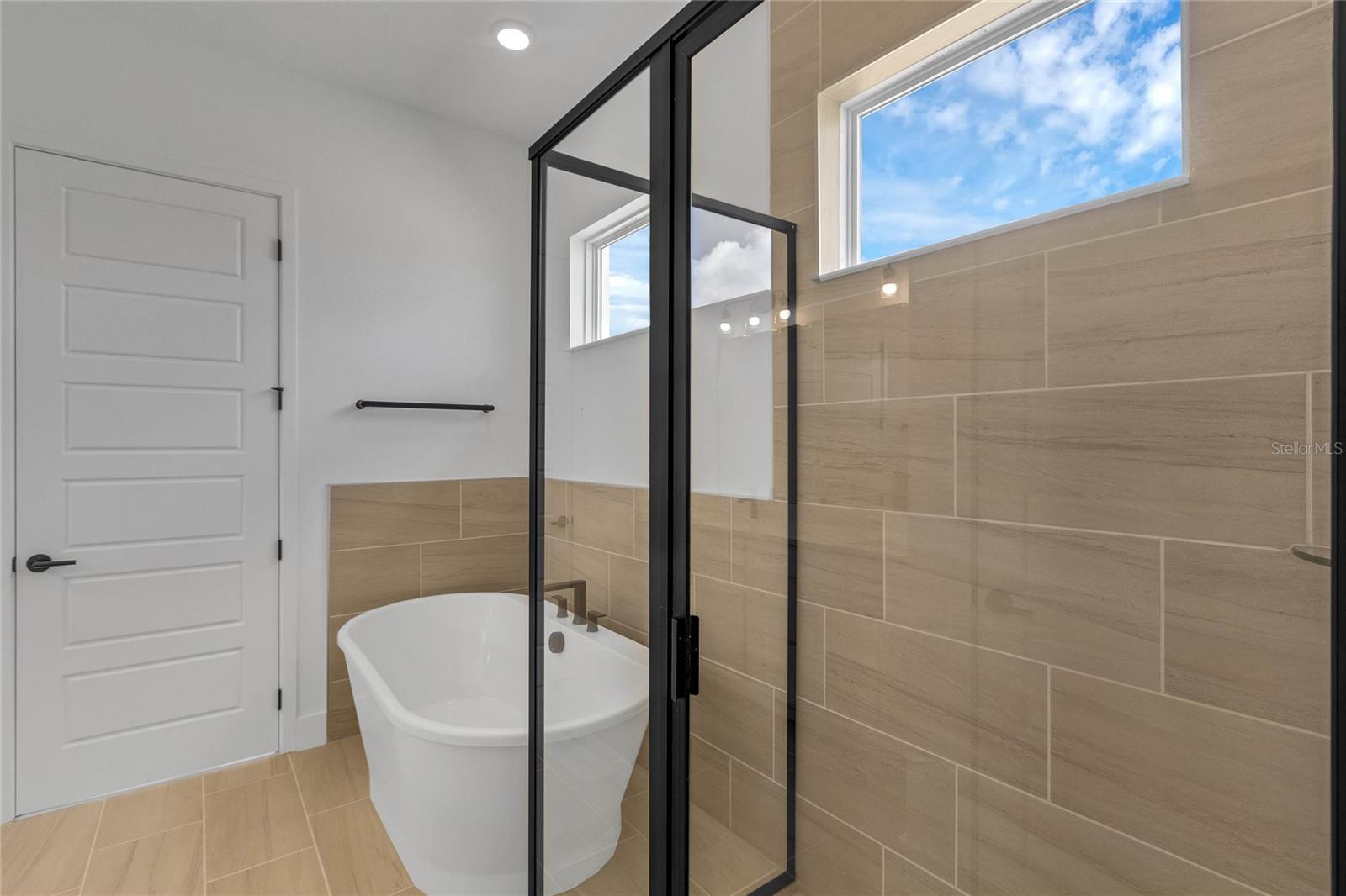 Primary bathroom (representative photo)