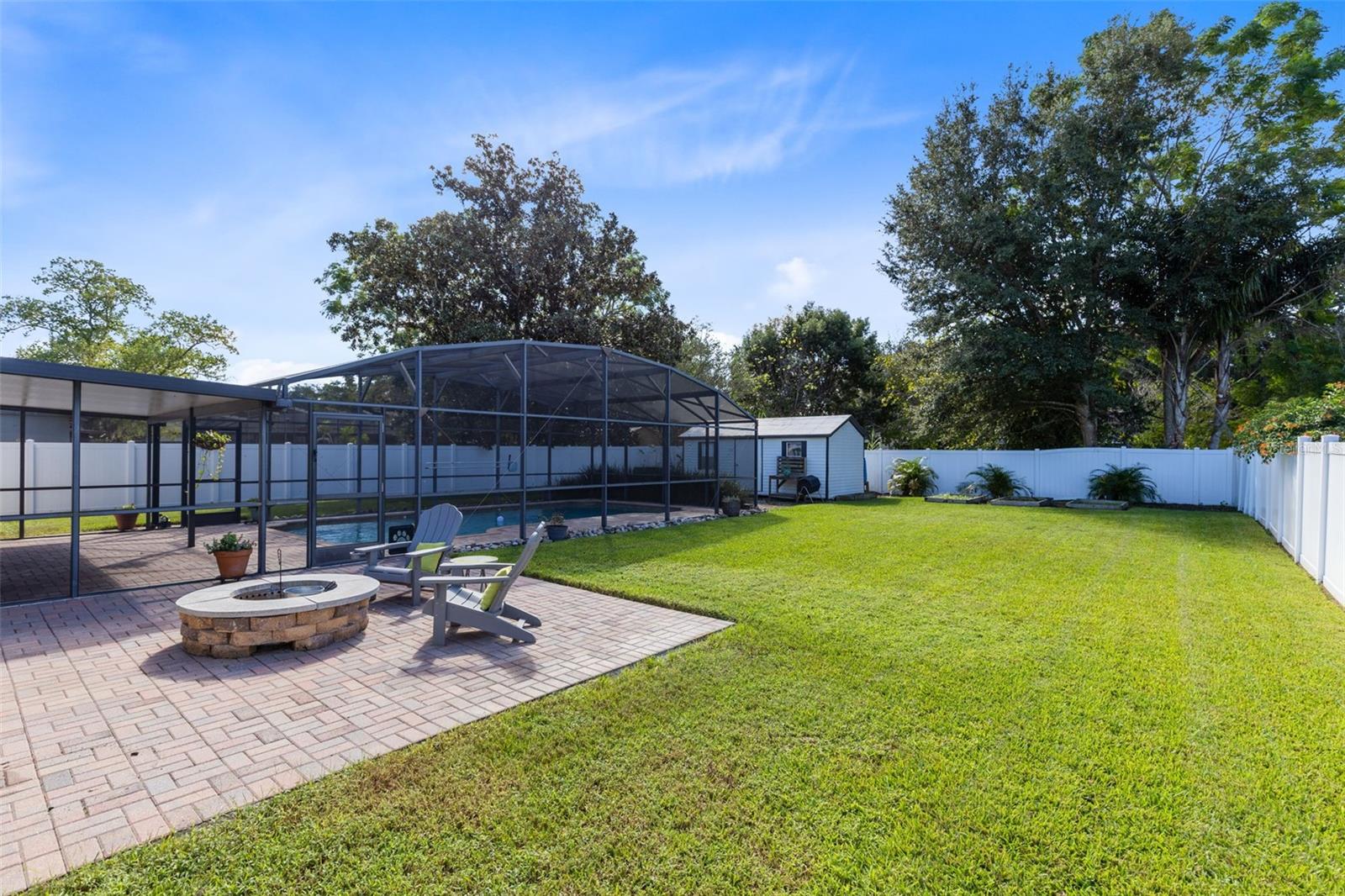 Lush backyard with firepit...Enjoy!