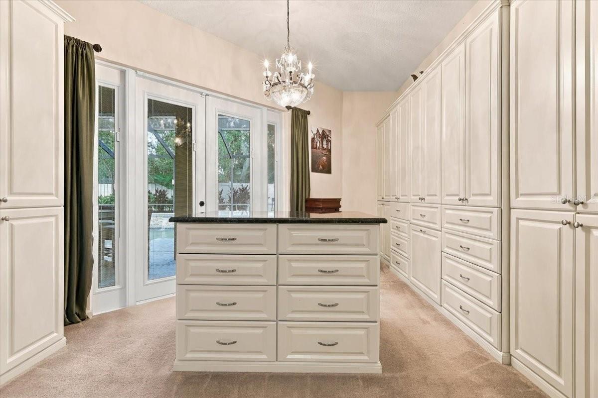 One of three walk-in closets!