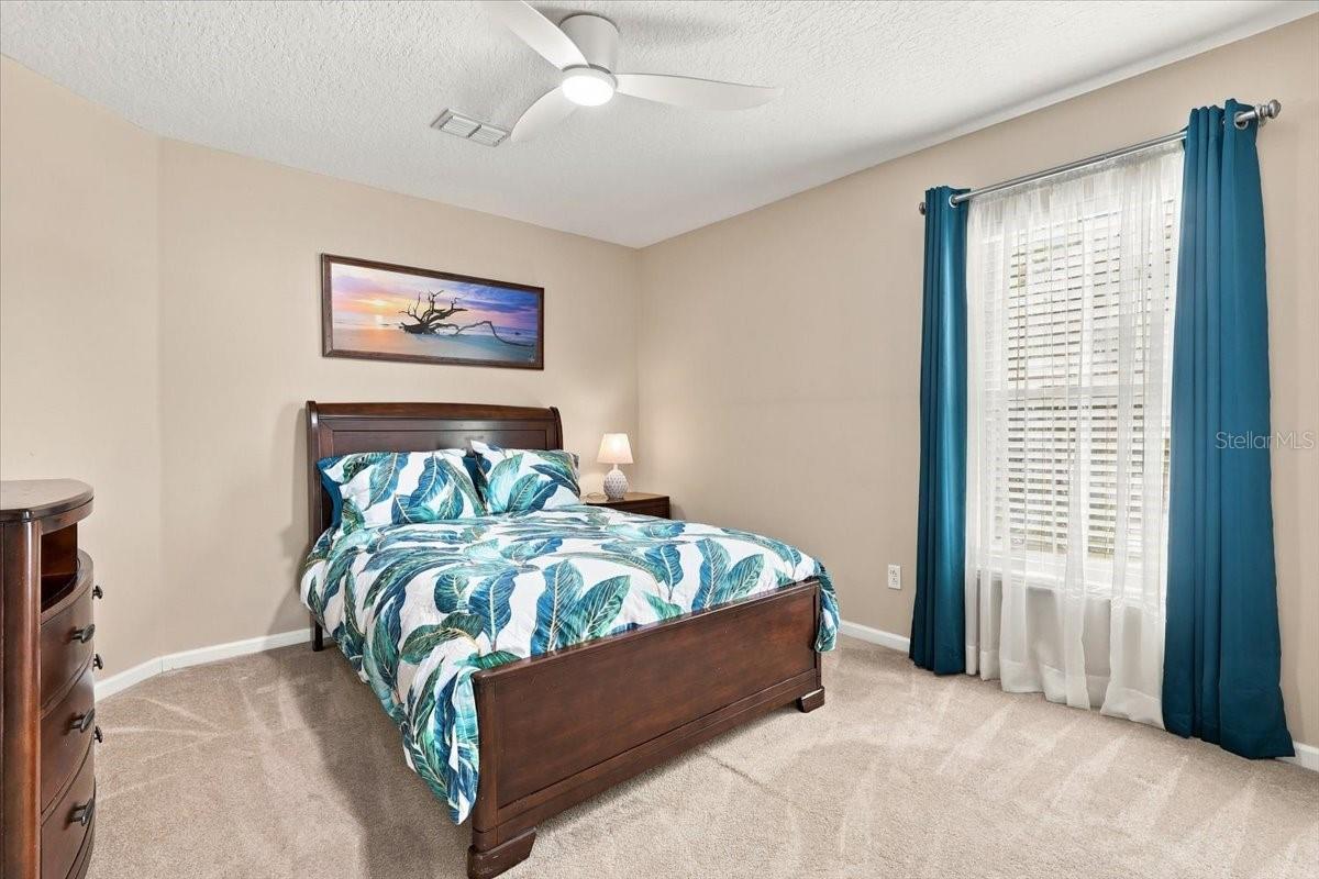 Main floor guest bedroom.