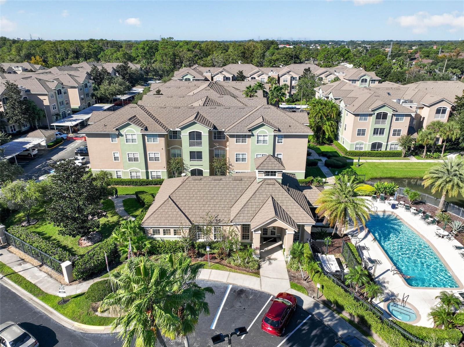 Aerial of clubhouse, pool and building