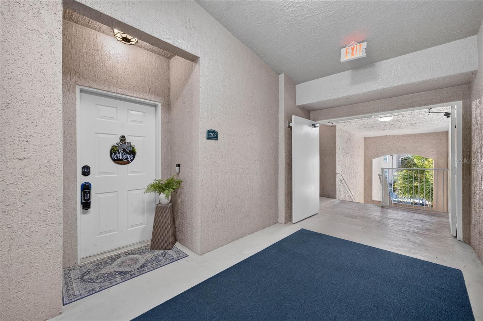 Front door and covered entry hallway