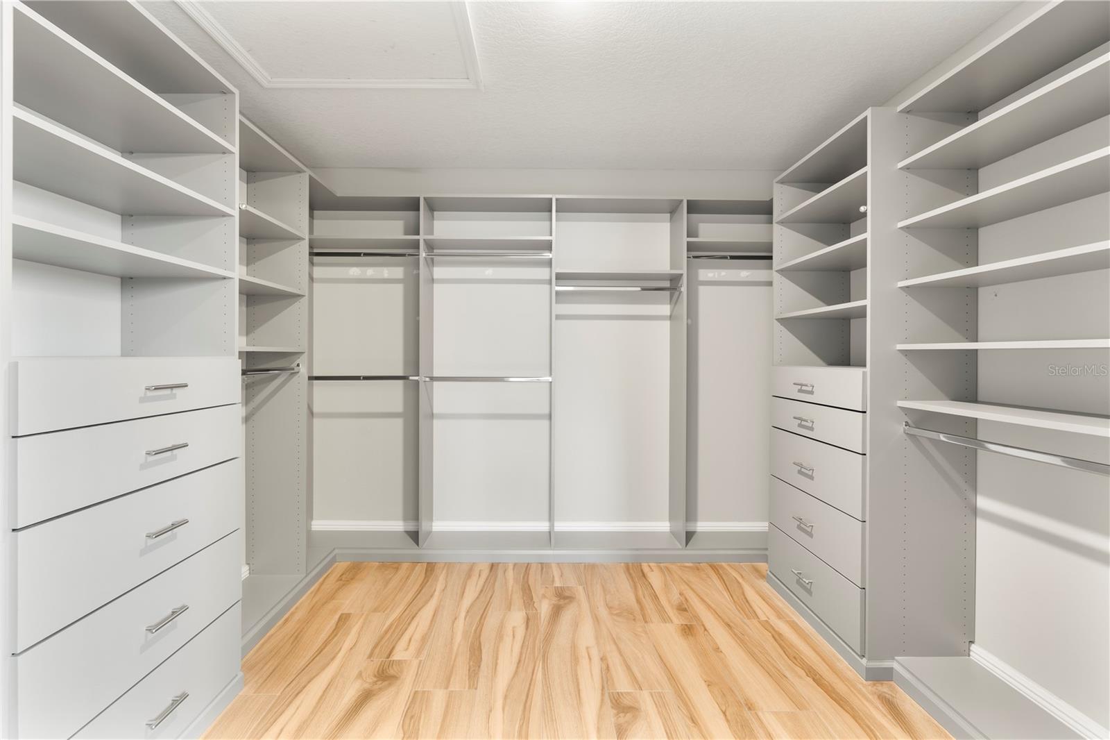 CUSTOM CALIFORNIA CLOSET (EN SUITE TO PRIMARY BEDROOM)