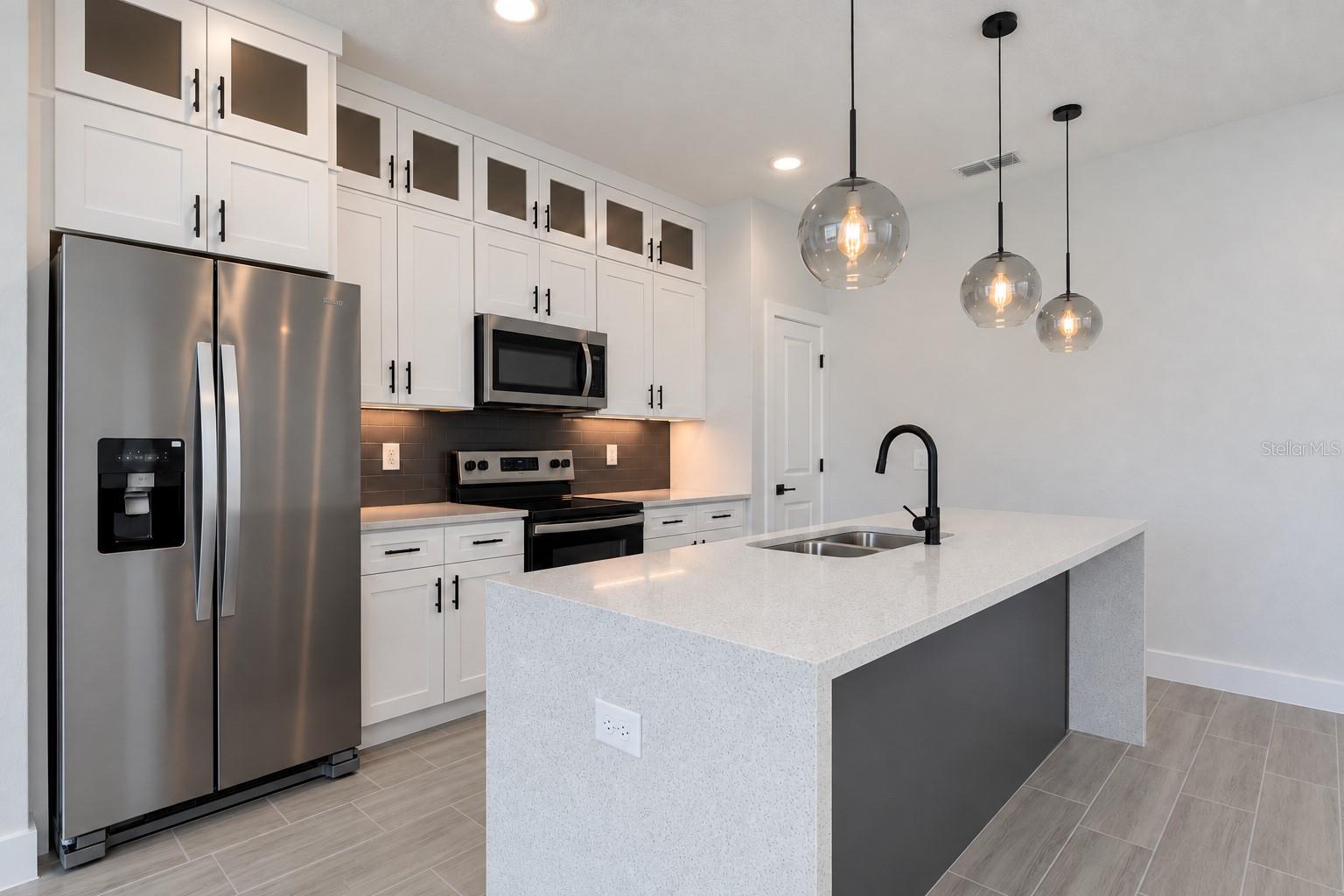 Kitchen. Digitally edited model/property composite.