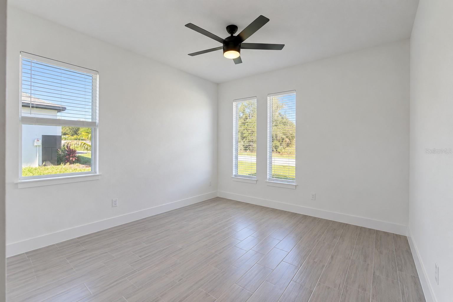 Front bedroom. Digitally edited model/property composite.