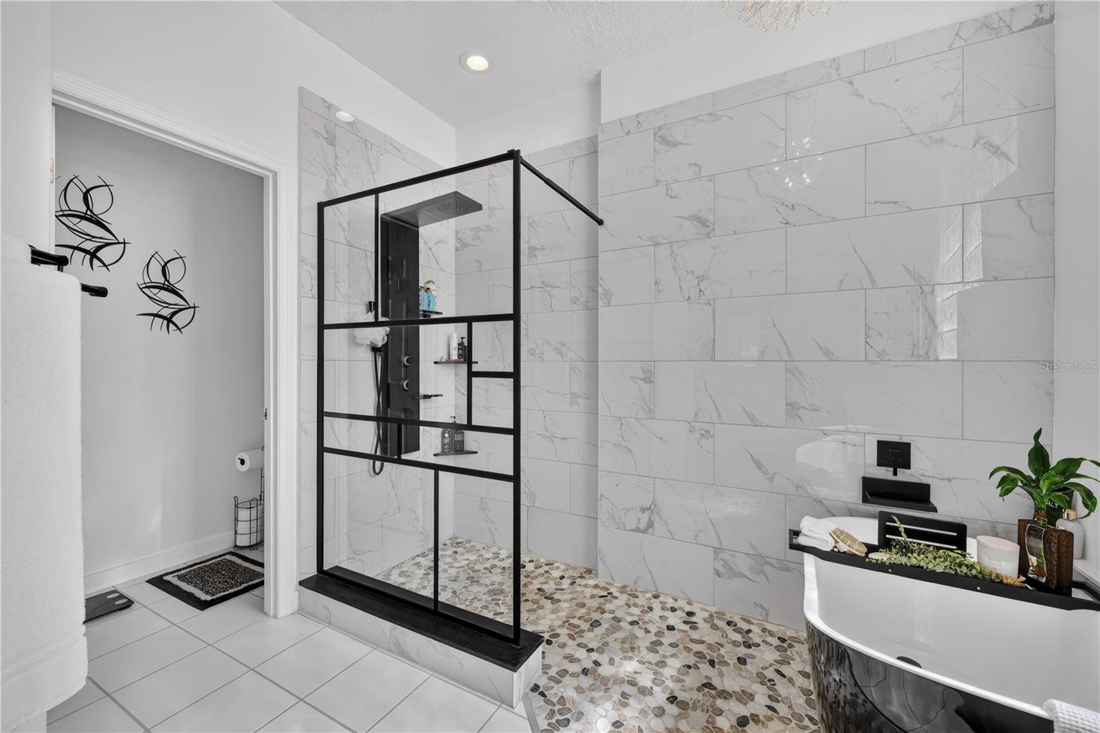 This shower enclosure is as beautiful as it is functional.