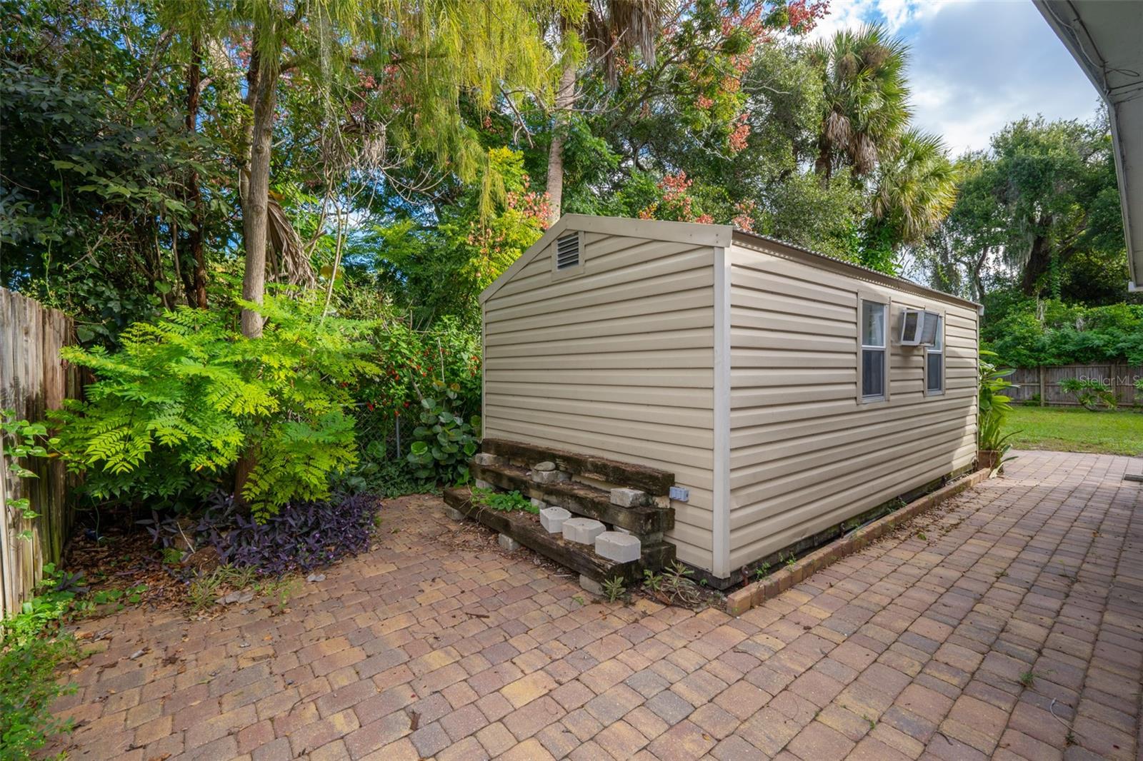 Shed with Wall AC on Paver Patio