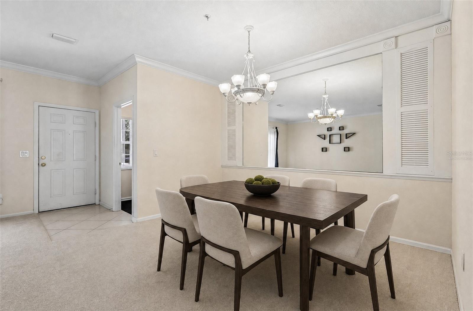 Formal dining at the front of the home. Virtually Staged.