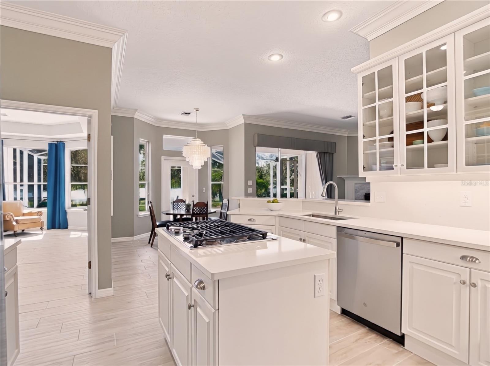 Refreshed gourmet kitchen opens to Living Room
