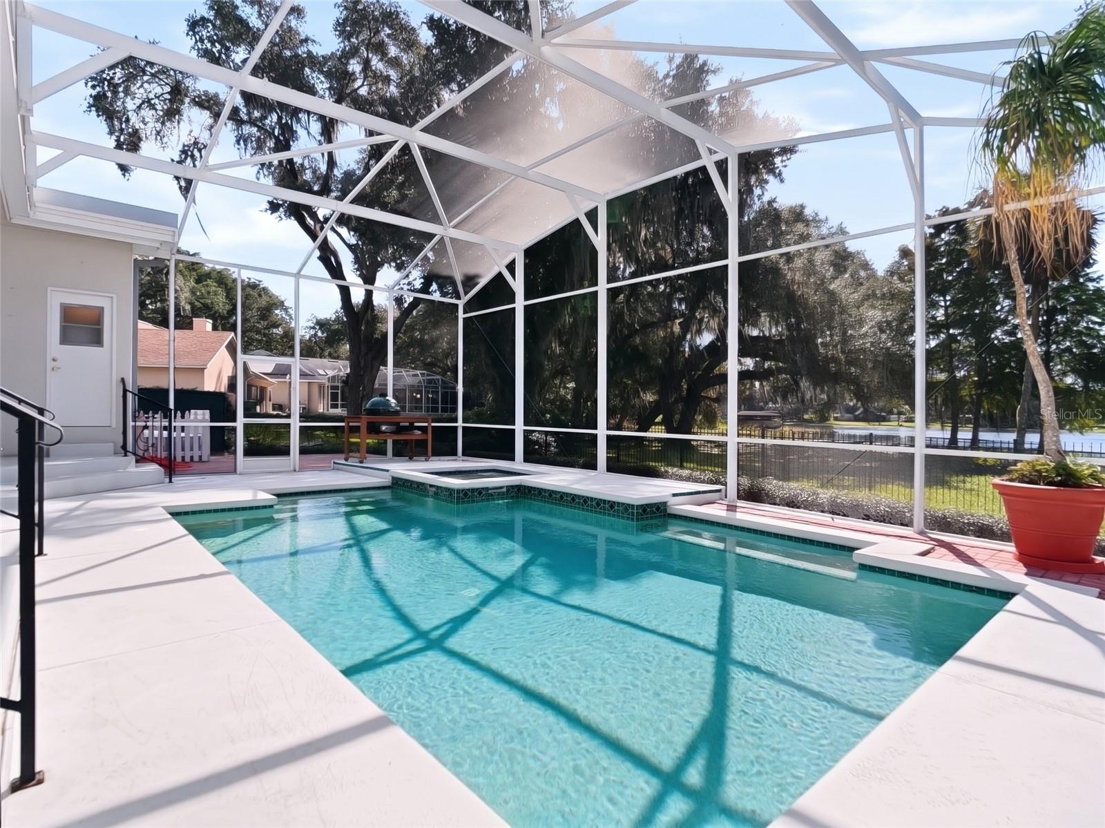Heated pool and spa with enclosure