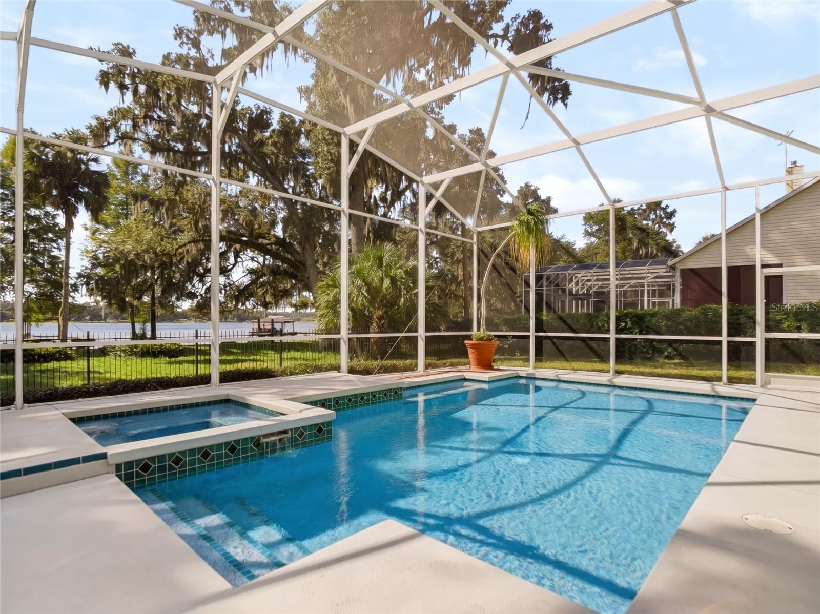 Heated pool and spa with enclosure