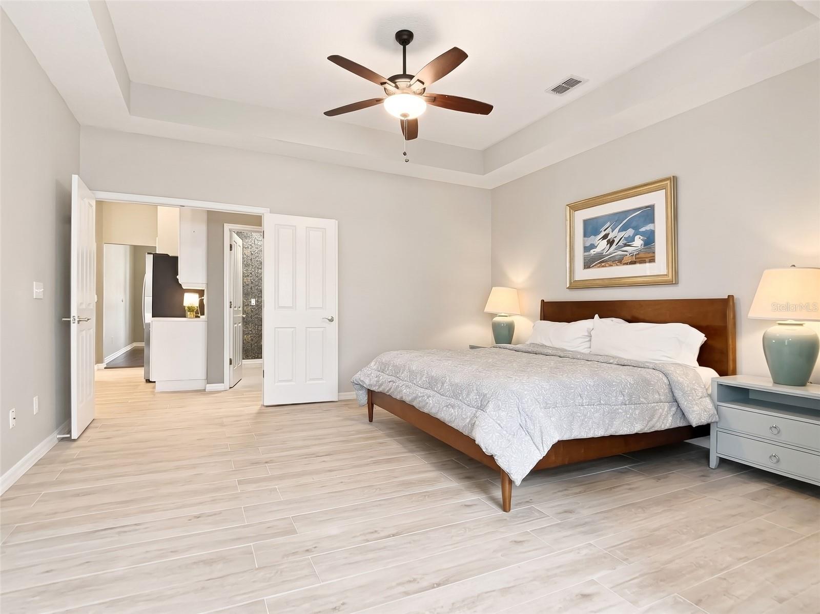Primary bedroom with lake views