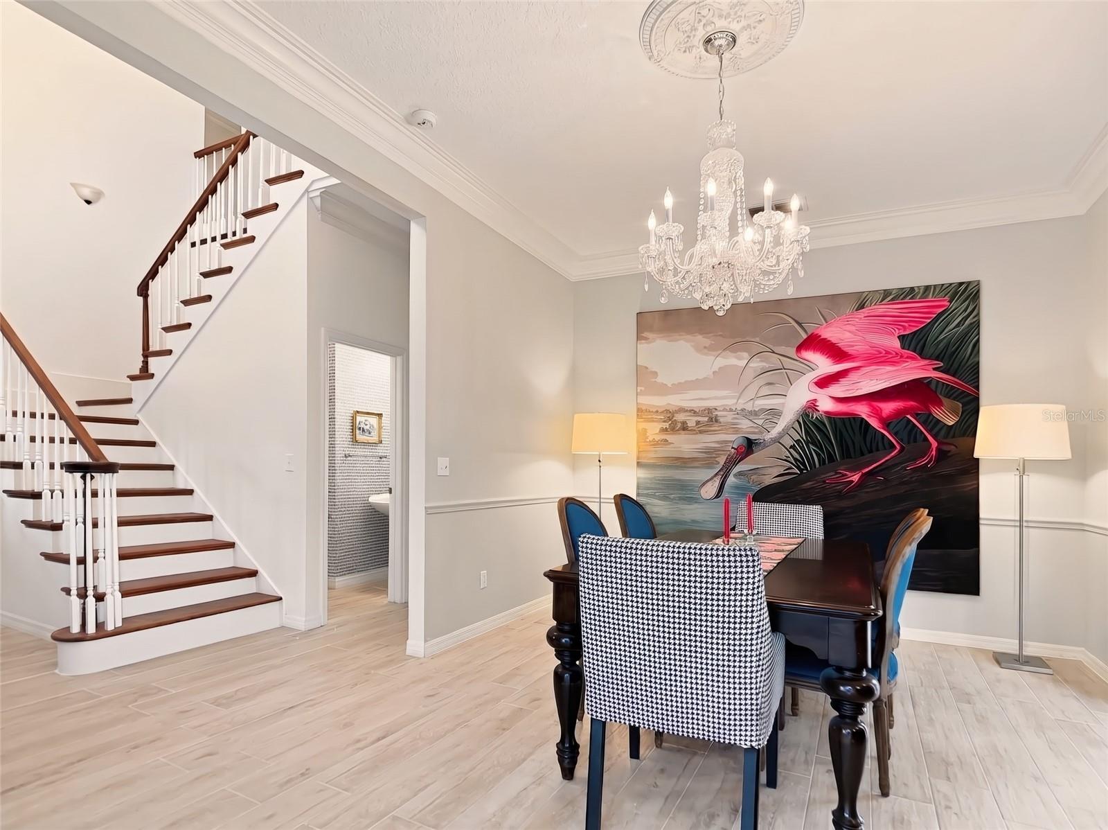 Grand foyer opens to formal living/dining room
